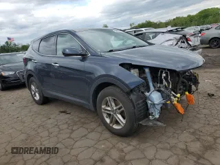 2018 Hyundai Santa Fe 2.4L z VIN 5NMZTDLB4JH066703, wystawiony jako Copart lot #54432155 z przebiegiem 67 737 mil mil oraz Szkoda całkowita • Salvage title. Historia ofert i sprzedaży dostępna na DreamBid. Obrazek 4.