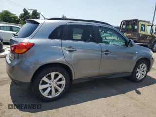 2015 Mitsubishi Outlander SE with VIN 4A4AR4AU2FE011699, listed as a Copart auction lot 60509945 with 141,192 mi miles and Salvage title. Bid and sale history available at DreamBid. Image 3.