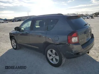 2016 Jeep Compass Sport SE with VIN 1C4NJDBBXGD523537, listed as a Copart auction lot 87664995 with 132,010 mi miles and Salvage title. Bid and sale history available at DreamBid. Image 2.