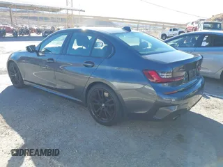 2022 BMW 3 Series 330i xDrive with VIN 3MW5R7J06N8C42529, listed as a IAAI auction lot 41272483 with 45,087 mi miles. Bid and sale history available at carsss.com. Image 3.