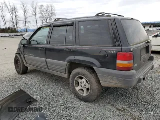 1996 Jeep Grand Cherokee Laredo with VIN 1J4GZ58S2TC174270, listed as a Copart auction lot 49924815 with 0 mi miles and Salvage Title. Bid and sale history available at carsss.com. Image 2.