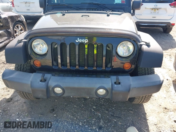 2009 Jeep Wrangler X with VIN 1J4FA24179L711352, listed as a IAAI auction lot 42577898 with 133,309 mi miles and . Bid and sale history available at DreamBid. Image 12.