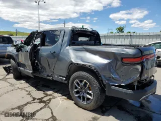 2023 Rivian R1T Launch Edition with VIN 7FCTGAALXPN020447, listed as a Copart auction lot 54154844 with 9,527 mi miles and Non Repairable. Bid and sale history available at carsss.com. Image 2.