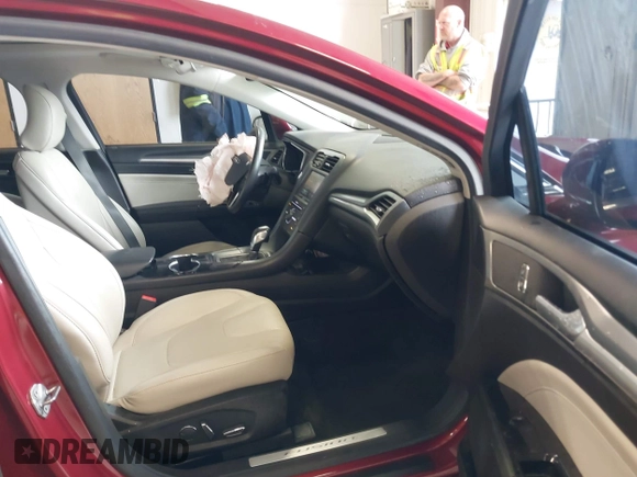2016 Ford Fusion Titanium z VIN 3FA6P0K95GR119017, wystawiony jako IAAI lot #42148460 z przebiegiem 84 770 mil mil oraz . Historia ofert i sprzedaży dostępna na DreamBid. Obrazek 5.