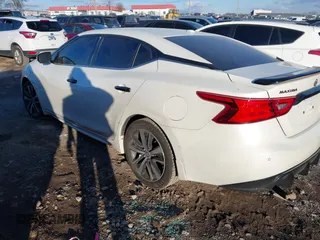 2018 Nissan Maxima SV with VIN 1N4AA6AP7JC372246, listed as a IAAI auction lot 41387139 with 104,686 mi miles and . Bid and sale history available at DreamBid. Image 3.