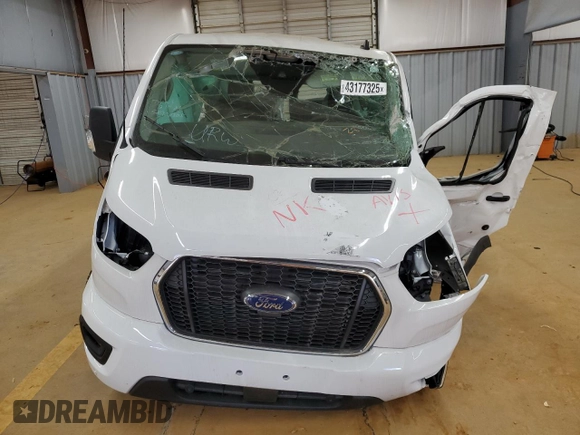 2023 Ford Transit Passenger XL z VIN 1FBAX2YGXPKB08481, wystawiony jako Copart lot #43177325 z przebiegiem Nie podano mil oraz Szkoda całkowita • Salvage title. Historia ofert i sprzedaży dostępna na DreamBid. Obrazek 5.