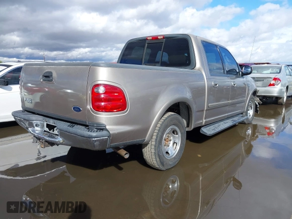 2003 Ford F-150 XLT with VIN 1FTRW07L53KD82167, listed as a IAAI auction lot 41745801 with 216,783 mi miles. Bid and sale history available at carsss.com. Image 4.