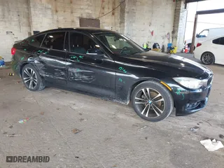 2014 BMW 3 Series Gran Turismo 328i xDrive with VIN WBA3X5C55ED242955, listed as a IAAI auction lot 41743111 with 71,095 mi miles. Bid and sale history available at carsss.com. Image 1.