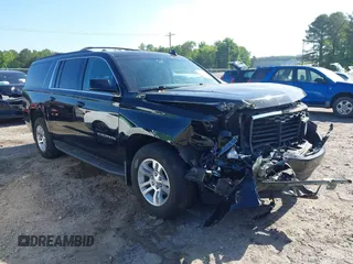 2019 Chevrolet Suburban LS with VIN 1GNSKGKC2KR353977, listed as a IAAI auction lot 42129814 with 85,454 mi miles and . Bid and sale history available at DreamBid. Image 1.