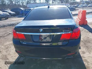 2011 BMW 7 Series 740i with VIN WBAKA4C58BC392020, listed as a IAAI auction lot 41314751 with 116,553 mi miles. Bid and sale history available at carsss.com. Image 16.