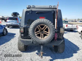 2014 Jeep Wrangler Unlimited Sport with VIN 1C4BJWDGXEL269693, listed as a Copart auction lot 46927895 with 105,691 mi miles and Salvage Title. Bid and sale history available at carsss.com. Image 6.