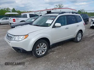 2013 Subaru Forester X Limited with VIN JF2SHAEC9DH401677, listed as a IAAI auction lot 42072338 with 288,909 mi miles and . Bid and sale history available at DreamBid. Image 2.