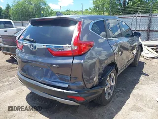 2019 Honda CR-V EX z VIN 7FARW1H58KE027824, wystawiony jako IAAI lot #42381140 z przebiegiem 96 241 mil mil oraz . Historia ofert i sprzedaży dostępna na DreamBid. Obrazek 4.