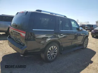 2015 Lincoln Navigator z VIN 5LMJJ2JT2FEJ03107, wystawiony jako Copart lot #56480805 z przebiegiem 176 627 mil mil oraz Czysty tytuł • Clean title. Historia ofert i sprzedaży dostępna na DreamBid. Obrazek 3.