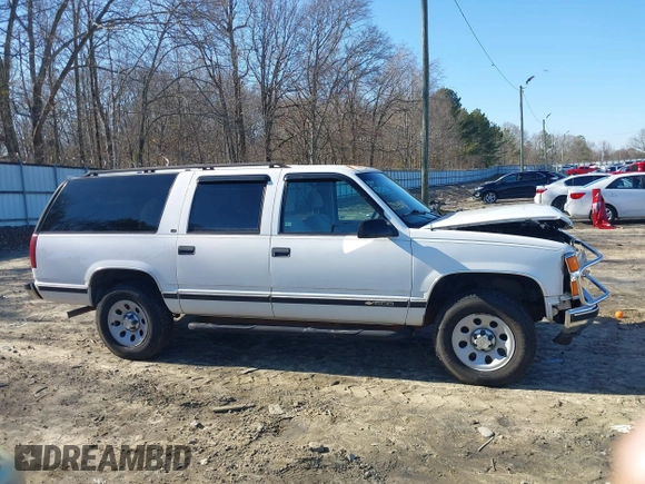 1996 Chevrolet Suburban with VIN 3GNFK16RXTG135350, listed as a IAAI auction lot 41482918 with 157,971 mi miles. Bid and sale history available at carsss.com. Image 13.