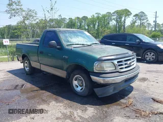 1999 Ford F-150 with VIN 1FTZF1726XNC01210, listed as a IAAI auction lot 42306335 with 225,829 mi miles and . Bid and sale history available at DreamBid. Image 1.