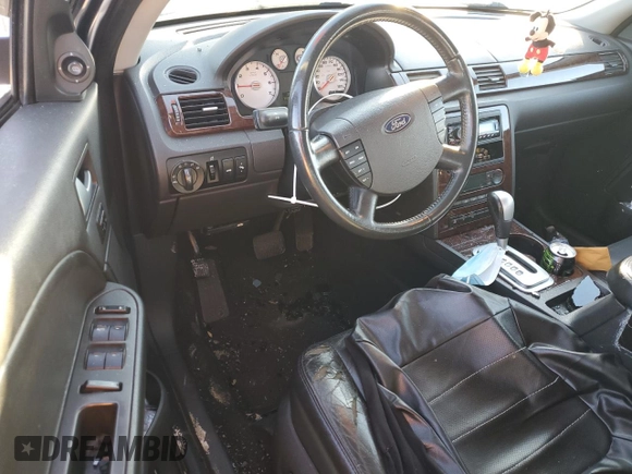 2005 Ford Five Hundred Limited with VIN 1FAFP25125G104464, listed as a Copart auction lot 84742674 with 234,363 mi miles and Salvage Title. Bid and sale history available at carsss.com. Image 8.