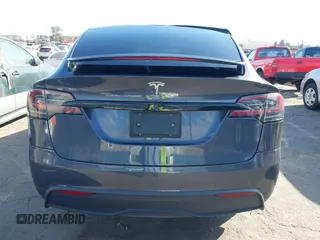 2023 Tesla Model X with VIN 7SAXCBE50PF378548, listed as a IAAI auction lot 41698357 with Not Provided miles and . Bid and sale history available at DreamBid. Image 16.