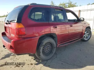 2006 GMC Envoy Denali with VIN 1GKES63M762237958, listed as a Copart auction lot 76999574 with 180,294 mi miles and Clean Title. Bid and sale history available at carsss.com. Image 3.