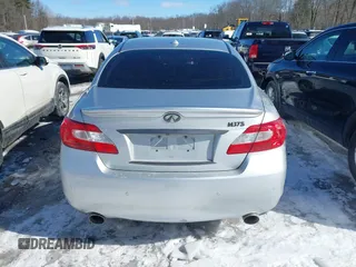 2013 Infiniti M z VIN JN1BY1AR6DM602407, wystawiony jako IAAI lot #41617455 z przebiegiem 99 195 mil mil oraz . Historia ofert i sprzedaży dostępna na DreamBid. Obrazek 16.