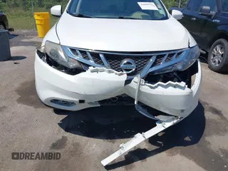 2014 Nissan Murano SV with VIN JN8AZ1MU3EW408031, listed as a IAAI auction lot 42060701 with 160,485 mi miles and . Bid and sale history available at carsss.com. Image 6.