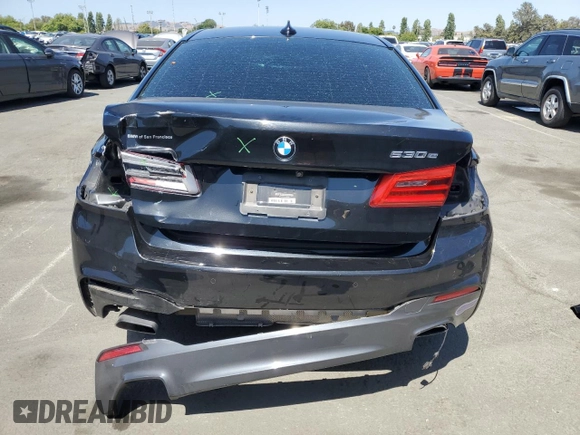 2018 BMW 5 Series 530e with VIN WBAJA9C50JB252458, listed as a Copart auction lot 58697585 with 89,050 mi miles and Salvage title. Bid and sale history available at DreamBid. Image 6.