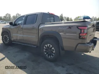 2022 Nissan Frontier Pro-X z VIN 1N6ED1EJ7NN616562, wystawiony jako Copart lot #62711855 z przebiegiem 19 579 mil mil oraz Szkoda całkowita • Salvage title. Historia ofert i sprzedaży dostępna na DreamBid. Obrazek 2.