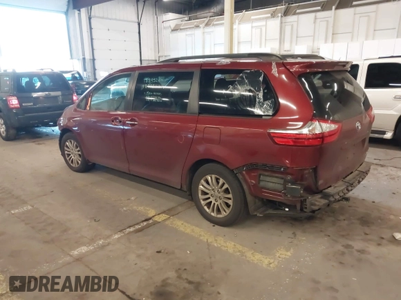 2016 Toyota Sienna XLE with VIN 5TDYK3DCXGS697980, listed as a IAAI auction lot 41500895 with 94,750 mi miles and . Bid and sale history available at DreamBid. Image 3.