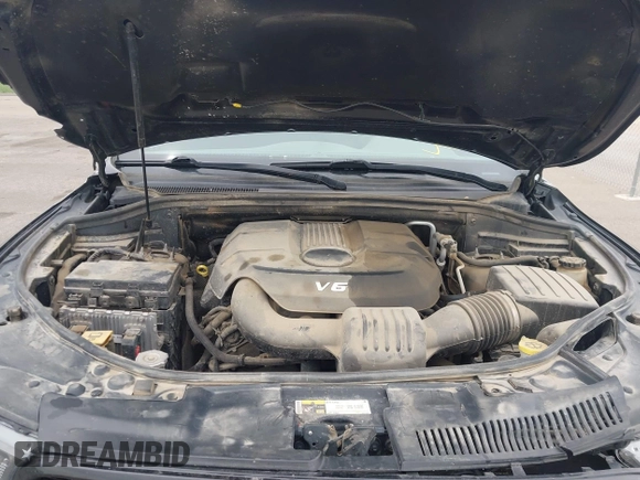 2014 Dodge Durango SXT with VIN 1C4RDJAG1EC552075, listed as a IAAI auction lot 42292301 with 122,427 mi miles and . Bid and sale history available at DreamBid. Image 10.
