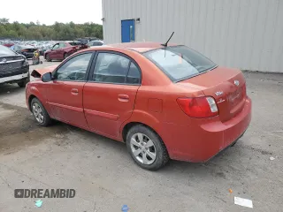 2010 Kia Rio LX with VIN KNADH4A37A6665399, listed as a Copart auction lot 72571284 with 132,610 mi miles and Salvage Title. Bid and sale history available at carsss.com. Image 2.