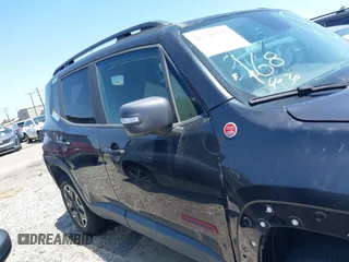 2017 Jeep Renegade Deserthawk z VIN ZACCJBCB4HPF18220, wystawiony jako IAAI lot #41719737 z przebiegiem 87 332 mil mil oraz . Historia ofert i sprzedaży dostępna na DreamBid. Obrazek 14.