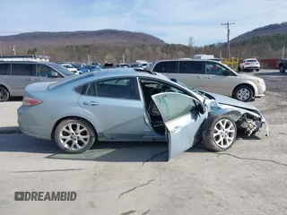 2009 Mazda 6 S Grand Touring with VIN 1YVHP82B595M21363, listed as a IAAI auction lot 41521753 with 135,000 mi miles and . Bid and sale history available at DreamBid. Image 13.