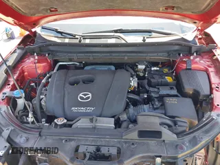 2019 Mazda CX-5 Sport with VIN JM3KFBBM6K1596402, listed as a IAAI auction lot 41971766 with 60,396 mi miles and . Bid and sale history available at DreamBid. Image 10.