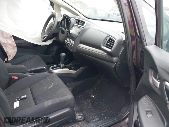 2015 Honda Fit EX-L z VIN 3HGGK5H84FM734308, wystawiony jako IAAI lot #42572565 z przebiegiem 130 513 mil mil oraz . Historia ofert i sprzedaży dostępna na DreamBid. Obrazek 5.