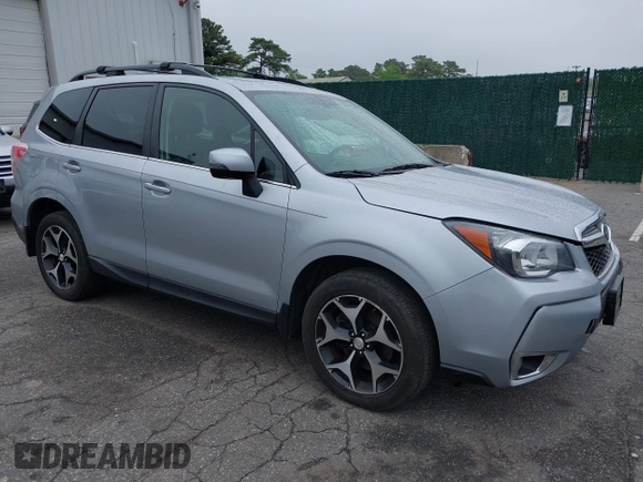 2014 Subaru Forester XT Touring with VIN JF2SJGMC1EH552474, listed as a IAAI auction lot 42461663 with 121,482 mi miles and . Bid and sale history available at DreamBid. Image 1.