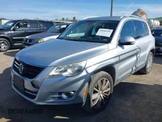 2011 Volkswagen Tiguan SE with VIN WVGBV7AX4BW561845, listed as a IAAI auction lot 41840195 with 171,929 mi miles and . Bid and sale history available at DreamBid. Image 2.