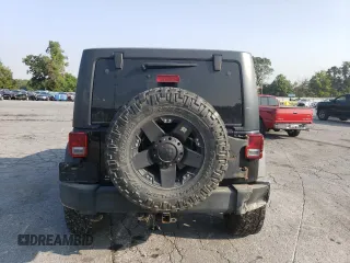 2018 Jeep Wrangler JK Unlimited Sport S with VIN 1C4BJWDG1JL907310, listed as a Copart auction lot 70826504 with 135,413 mi miles and Salvage Title. Bid and sale history available at carsss.com. Image 6.