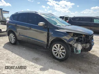 2017 Ford Escape Titanium with VIN 1FMCU0J95HUF02694, listed as a Copart auction lot 49861745 with 114,602 mi miles and Salvage Title. Bid and sale history available at DreamBid. Image 4.