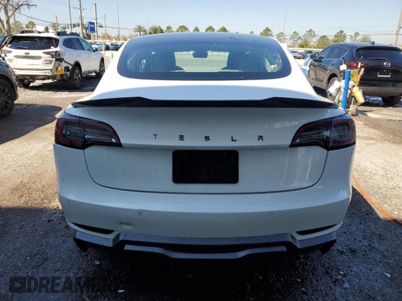 2020 Tesla Model 3 Standard Range Plus with VIN 5YJ3E1EA6LF661513, listed as a Copart auction lot 47008985 with 128,362 mi miles and Non Repairable. Bid and sale history available at DreamBid. Image 6.