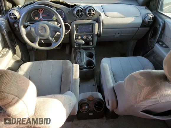 2002 Pontiac Aztek z VIN 3G7DA03E12S582738, wystawiony jako Copart lot #53028495 z przebiegiem 153 228 mil mil oraz Szkoda całkowita • Salvage title. Historia ofert i sprzedaży dostępna na DreamBid. Obrazek 8.
