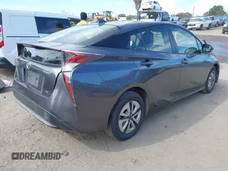 2016 Toyota Prius Four z VIN JTDKARFU2G3022031, wystawiony jako IAAI lot #41631802 z przebiegiem 151 389 mil mil oraz . Historia ofert i sprzedaży dostępna na DreamBid. Obrazek 4.