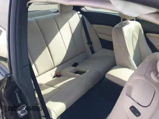 2015 BMW 2 Series M235i with VIN WBA1J7C55FV358964, listed as a IAAI auction lot 41674800 with 63,504 mi miles and . Bid and sale history available at carsss.com. Image 8.