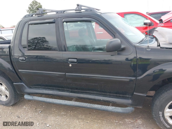 2004 Ford Explorer Sport Trac XLS with VIN 1FMZU77K64UB43072, listed as a IAAI auction lot 41555127 with 175,269 mi miles. Bid and sale history available at carsss.com. Image 14.