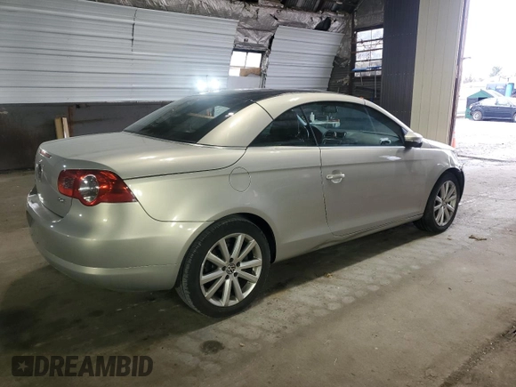 2009 Volkswagen Eos Komfort with VIN WVWBA71F69V019864, listed as a Copart auction lot 52378095 with 142,774 mi miles and Salvage Title. Bid and sale history available at DreamBid. Image 3.