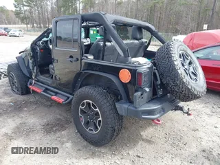 2015 Jeep Wrangler Unlimited Rubicon z VIN 1C4BJWFG7FL711036, wystawiony jako IAAI lot #41604648 z przebiegiem 167 678 mil mil oraz . Historia ofert i sprzedaży dostępna na DreamBid. Obrazek 3.