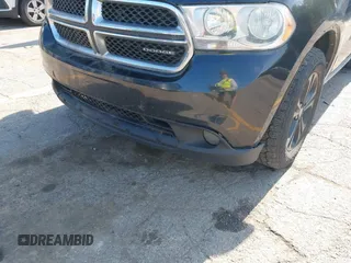 2012 Dodge Durango SXT z VIN 1C4RDJAGXCC207284, wystawiony jako IAAI lot #42379109 z przebiegiem 266 270 mil mil oraz . Historia ofert i sprzedaży dostępna na DreamBid. Obrazek 18.