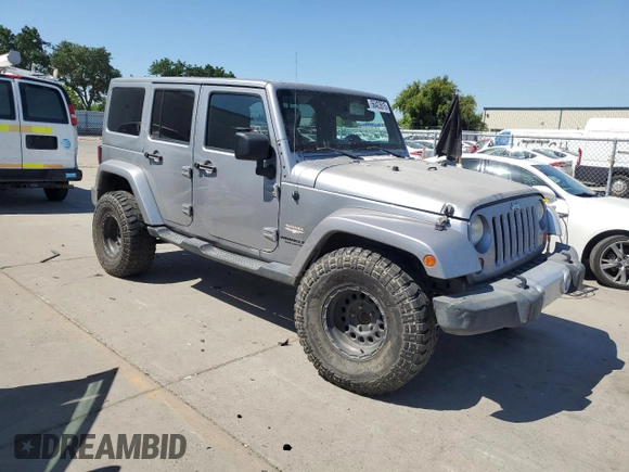 2013 Jeep Wrangler Unlimited Sahara with VIN 1C4BJWEG5DL662756, listed as a Copart auction lot 56423615 with 189,355 mi miles and Salvage title. Bid and sale history available at DreamBid. Image 4.