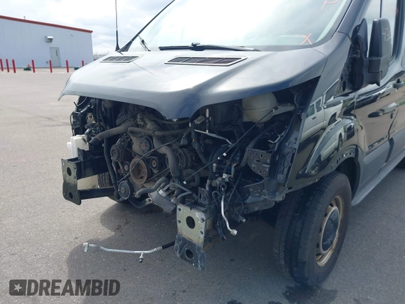 2015 Ford Transit Cargo with VIN 1FTYE1YM9FKA27910, listed as a IAAI auction lot 39414304 with 156,451 mi miles and . Bid and sale history available at DreamBid. Image 6.