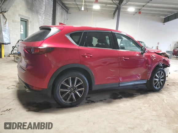 2018 Mazda CX-5 Grand Touring z VIN JM3KFBDMXJ0432197, wystawiony jako Copart lot #50383035 z przebiegiem Nie podano mil oraz Szkoda całkowita • Salvage title. Historia ofert i sprzedaży dostępna na DreamBid. Obrazek 3.