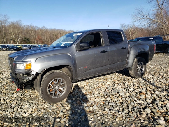 2021 GMC Canyon 4WD AT4 w/Cloth with VIN 1GTG6FEN0M1236099, listed as a Copart auction lot 80911974 with 122,672 mi miles and Salvage Title. Bid and sale history available at carsss.com. Image 1.
